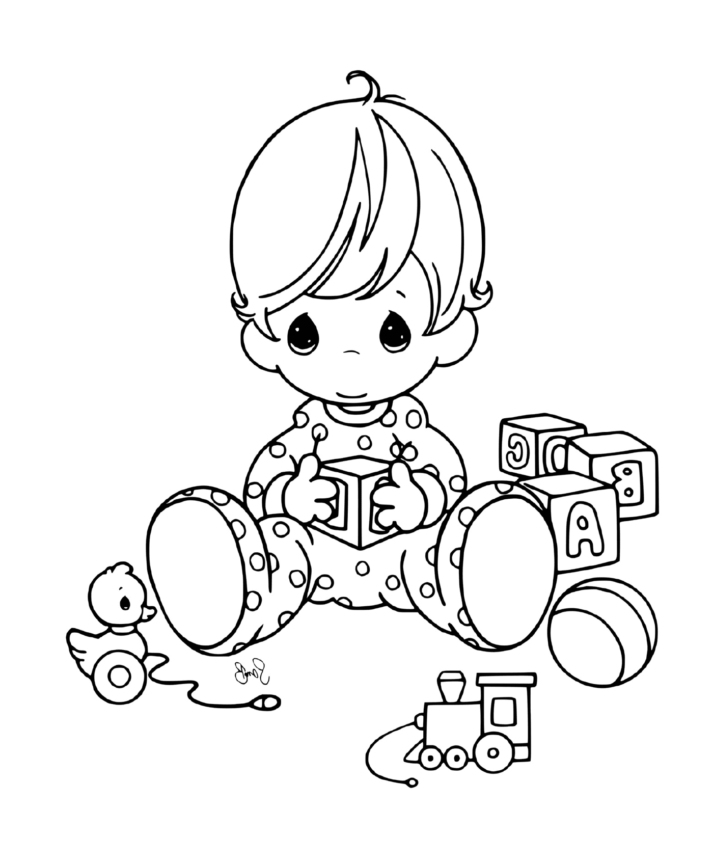  Un bebé con sus juguetes 