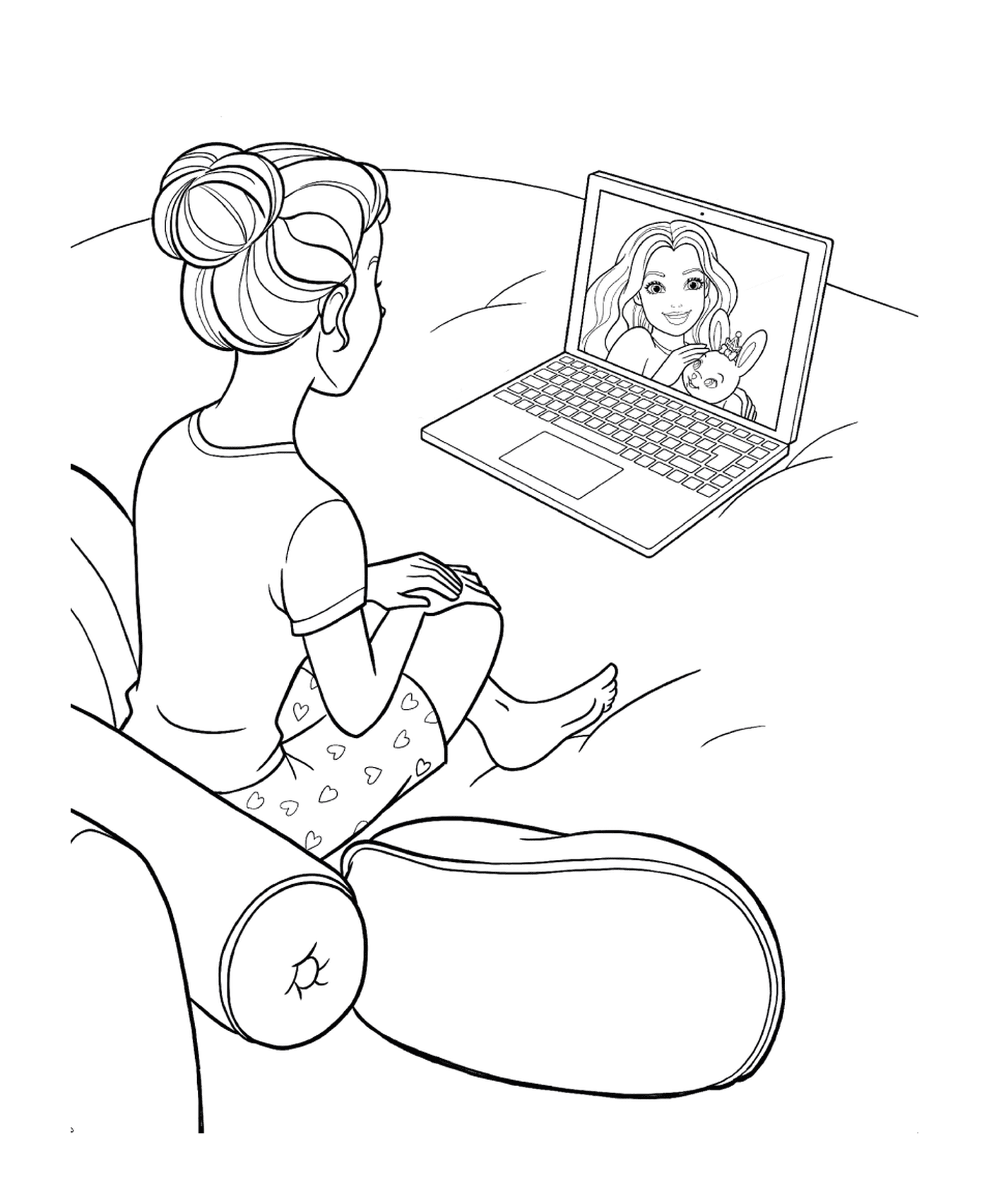  A woman sitting in front of a laptop 