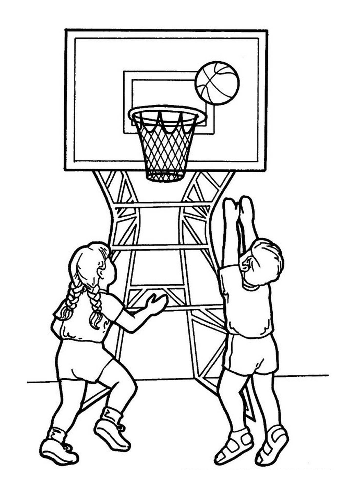  A boy and a girl play basketball 