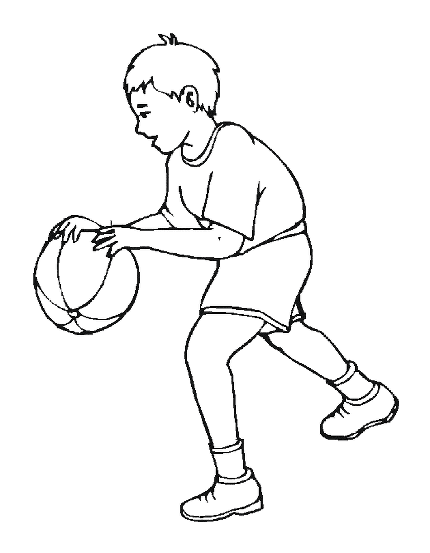  Un niño juega al baloncesto 