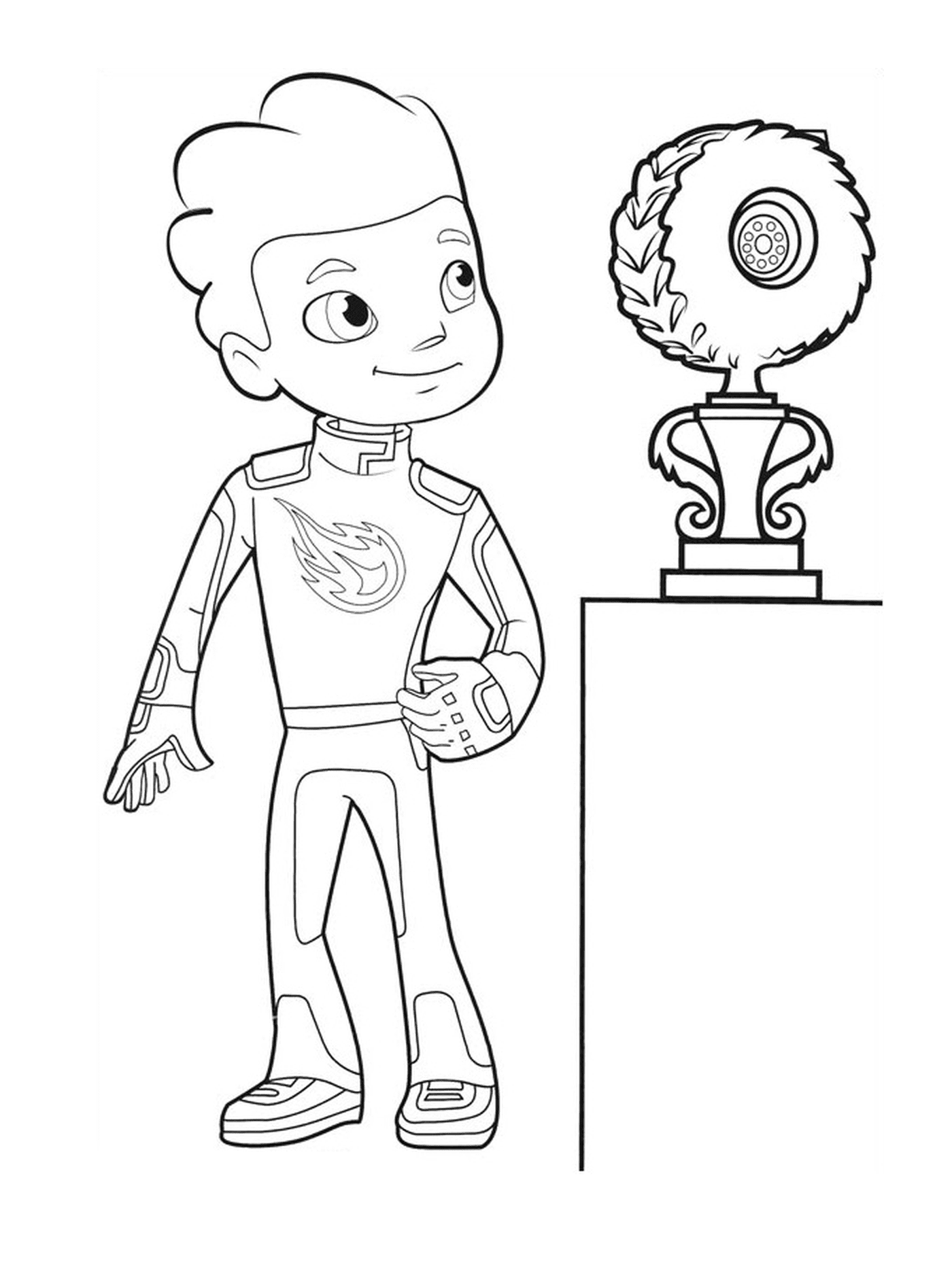  A boy standing next to a trophy 