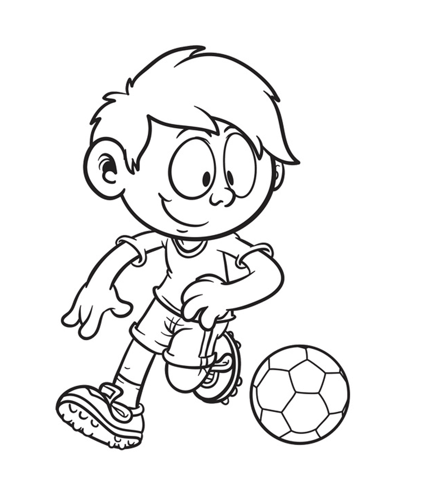  Ten-year-old boy playing football 