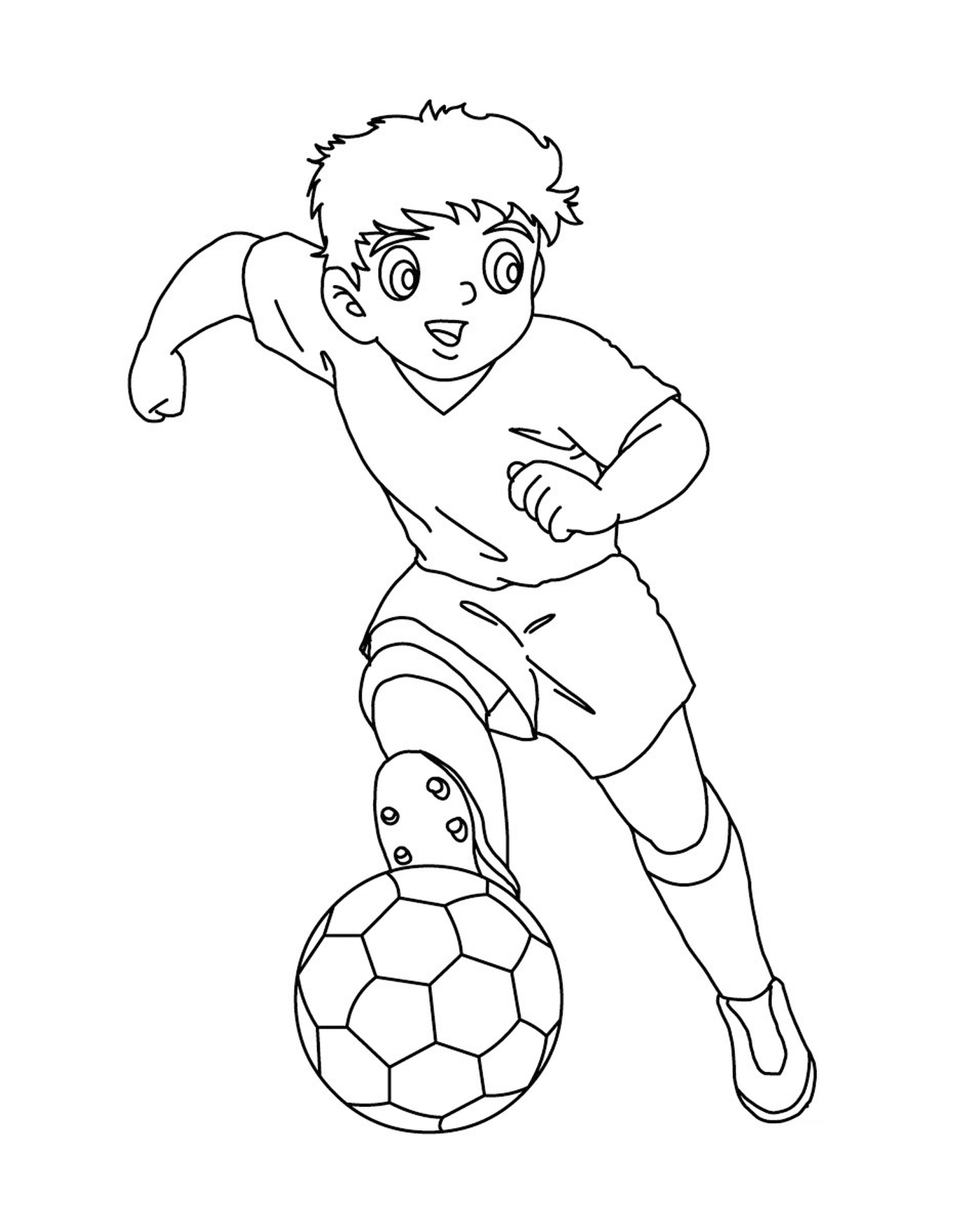  Мальчик играет в футбол, как капитан Цубаса 