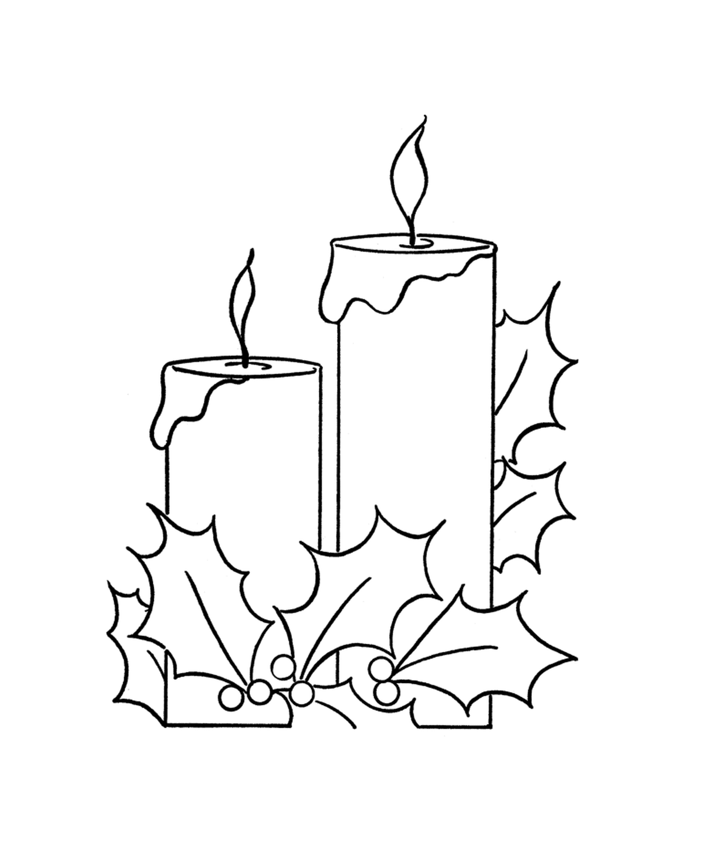  Dos velas encendidas con una rama de acebo 