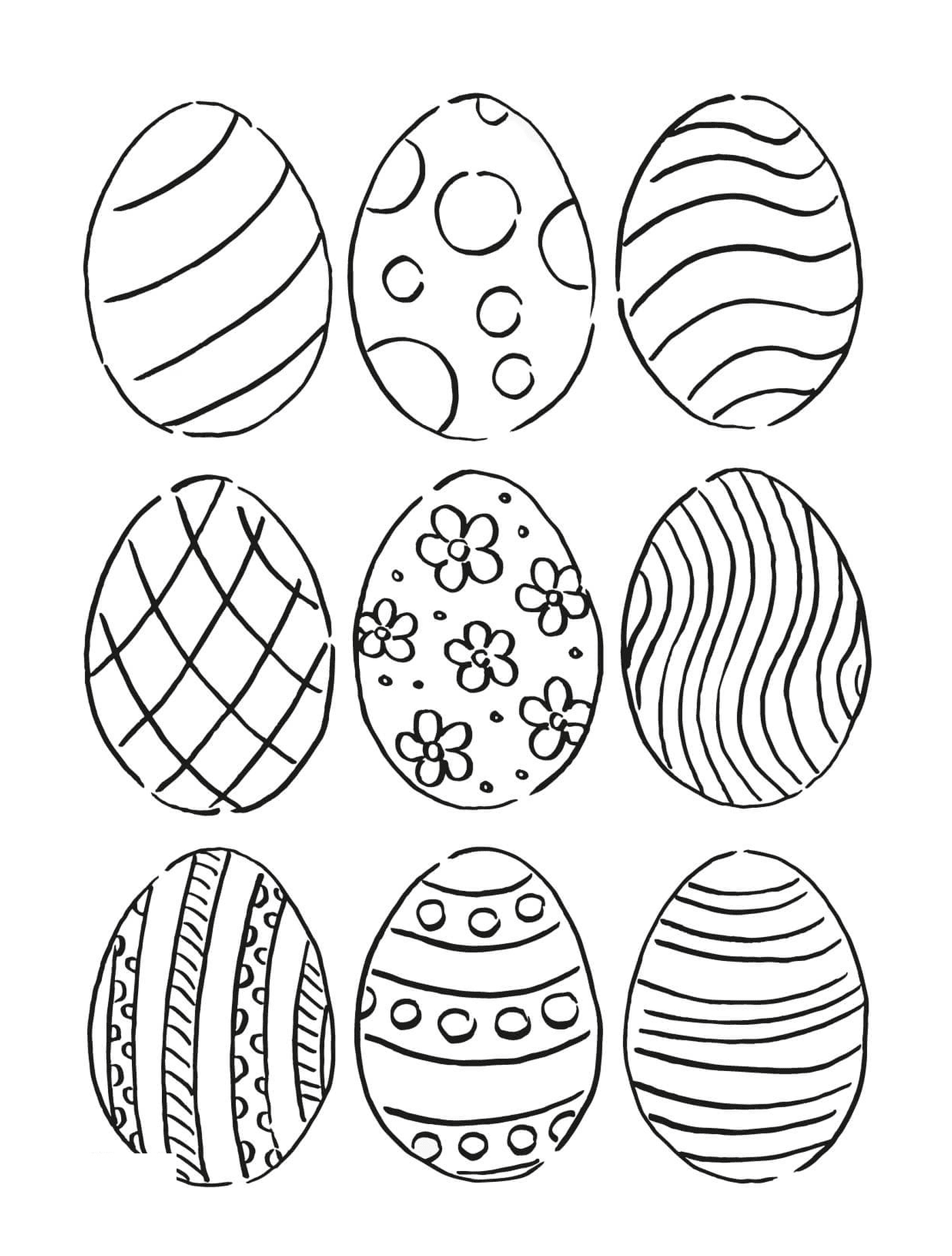  Set of nine eggs with different patterns 