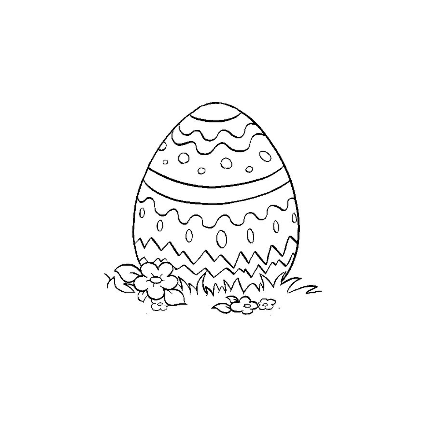  Пасхальное яйцо, уложенное в траву 