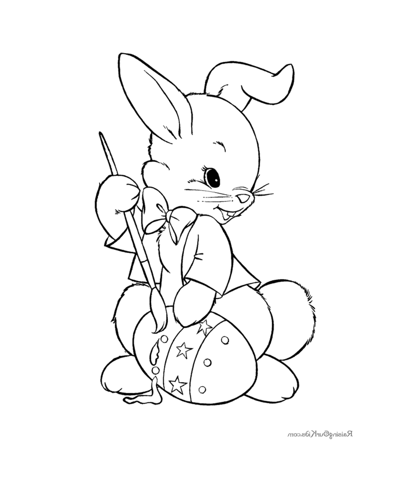  Un conejo de Pascua con un huevo 