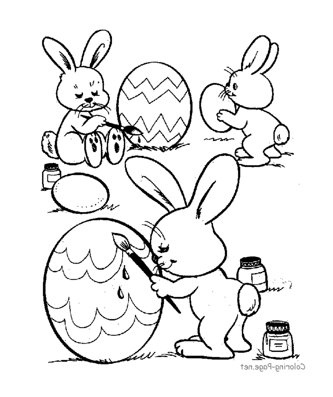  Un grupo de conejos pintando huevos de Pascua 
