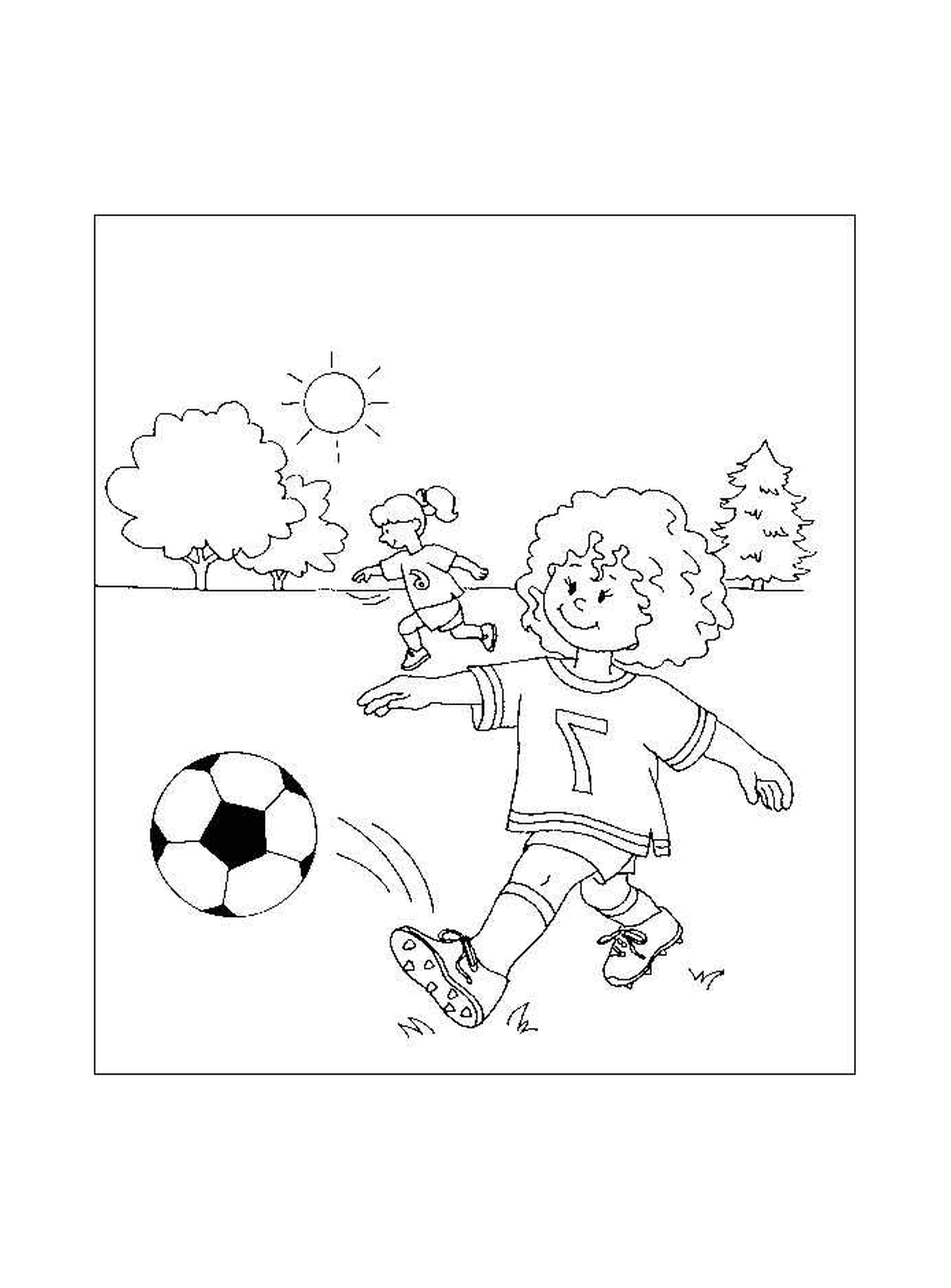  Ein Junge spielt Fußball 