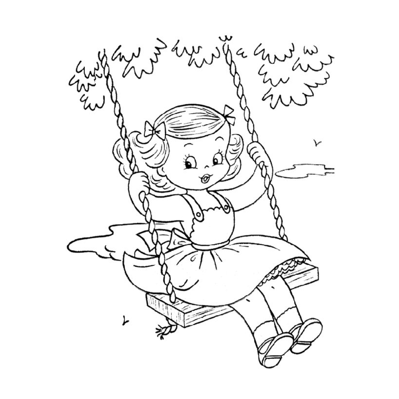  Una ragazzina dondola su un'altalena 