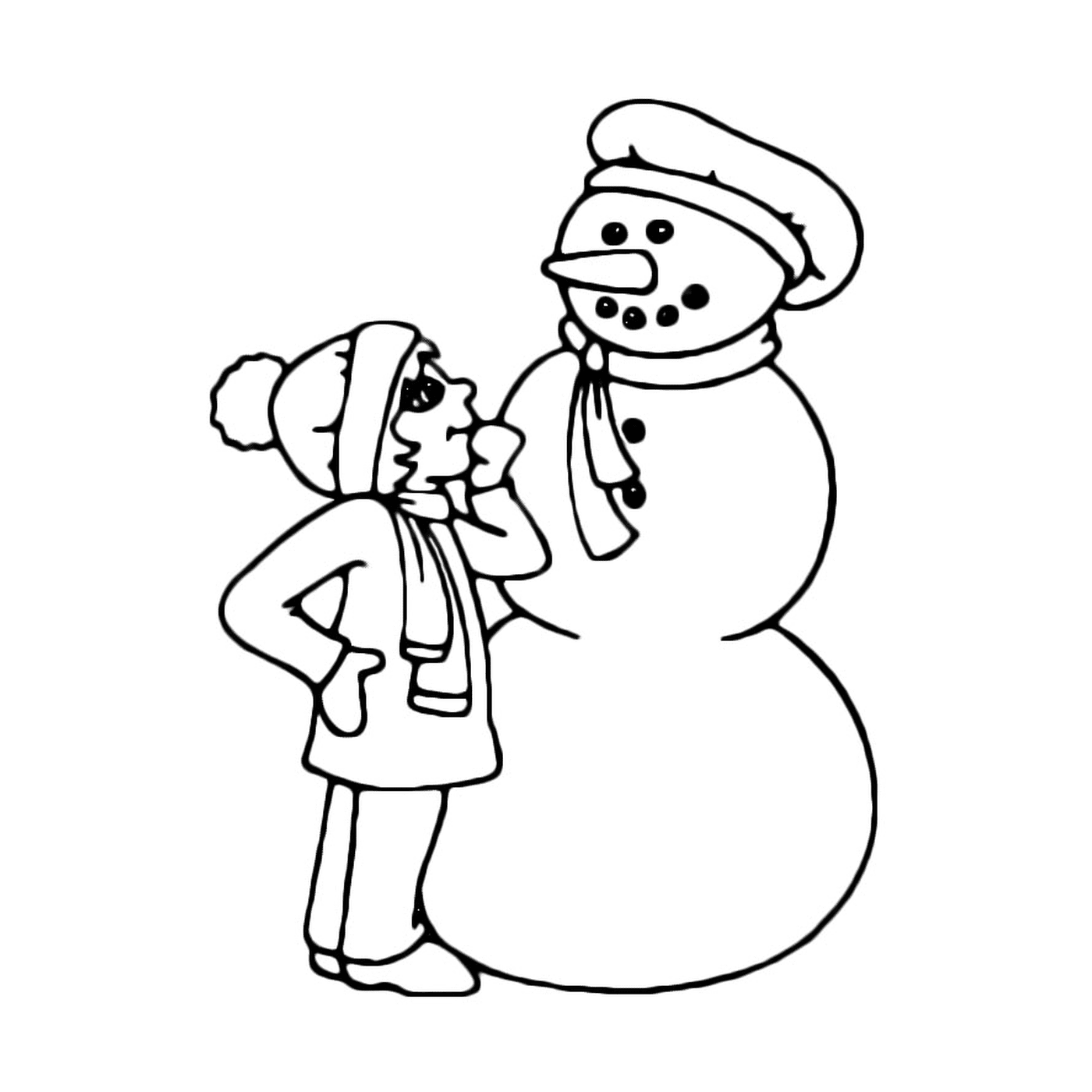 A woman standing next to a snowman wearing a hat 