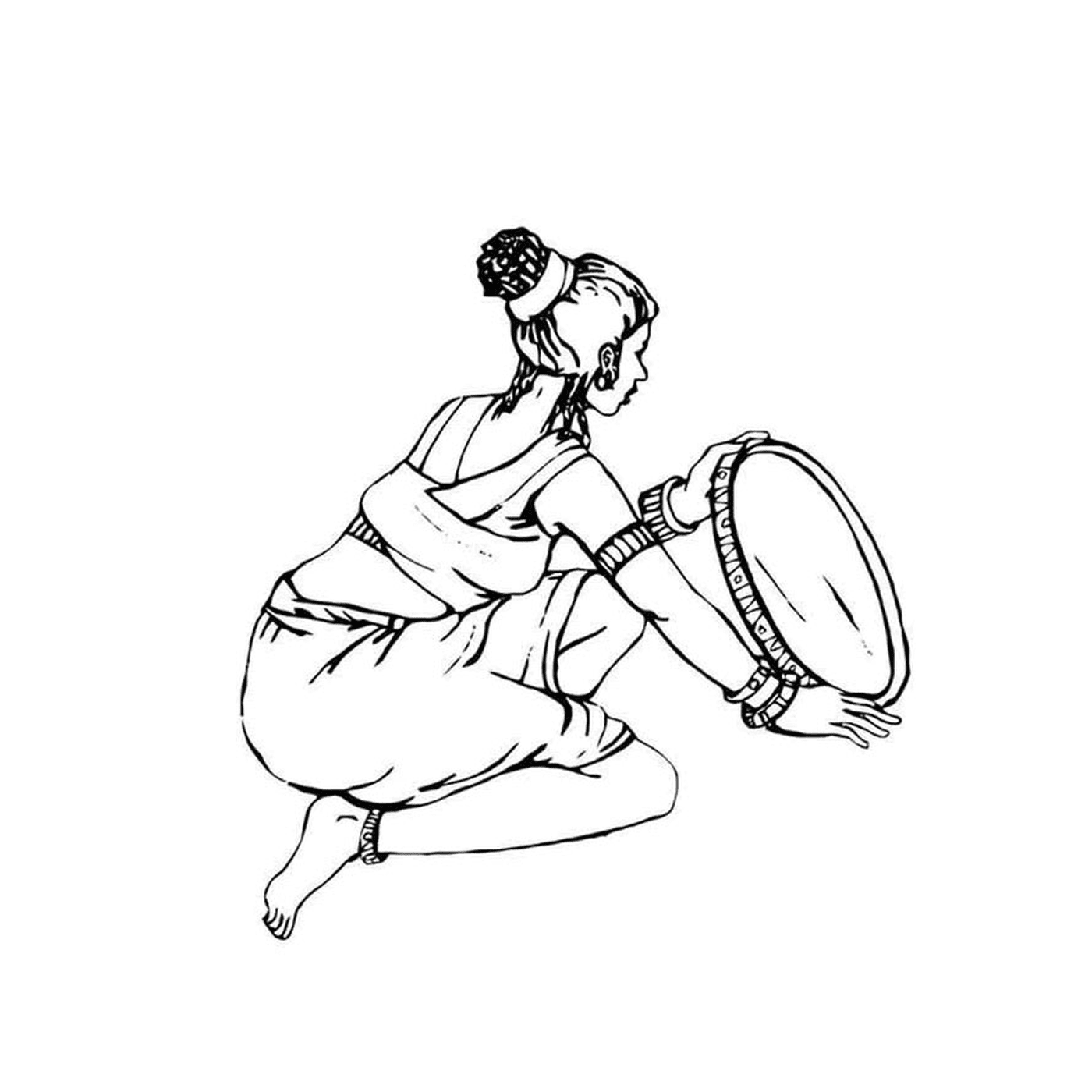  A woman holding a tambourine 