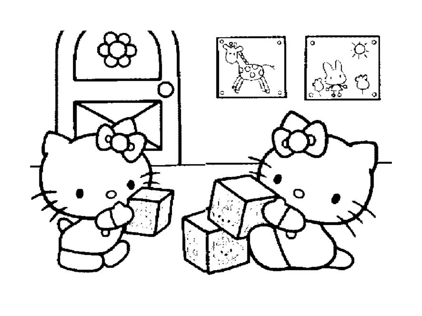  Zwei Hello Kittys sitzen auf Blöcken 