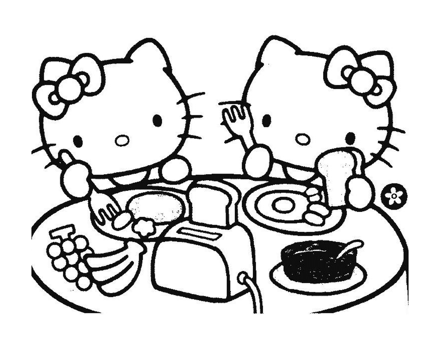  Two Hello Kitty sitting at a table 