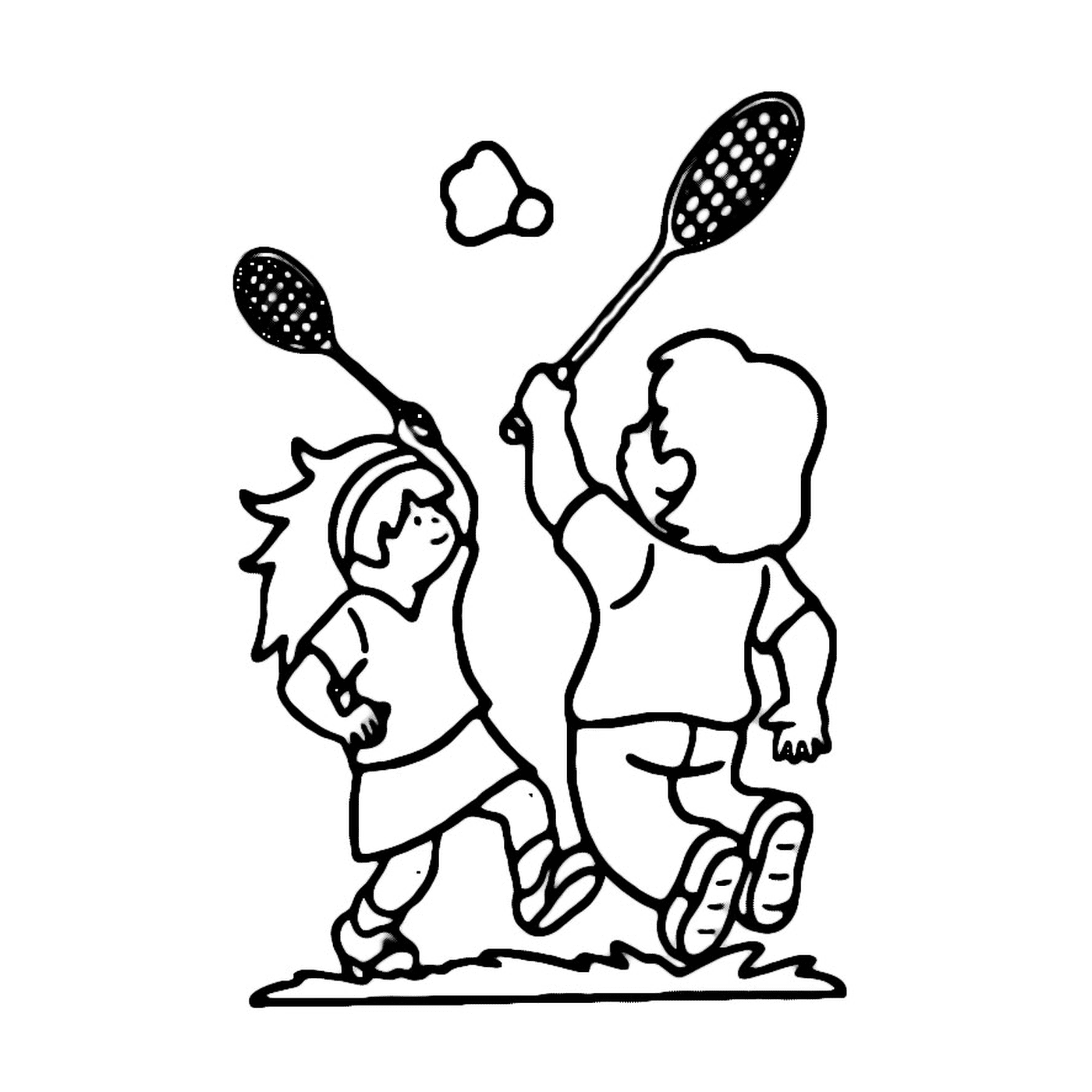  Two children play badminton in a field 