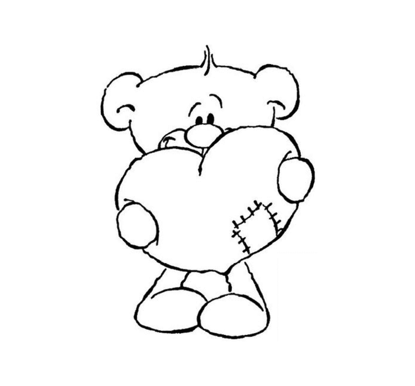 A teddy bear holding a heart in his hands 