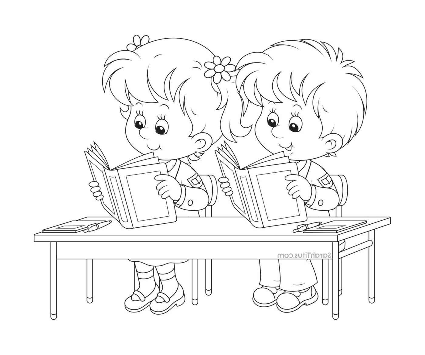  Two little children reading a book at an office 