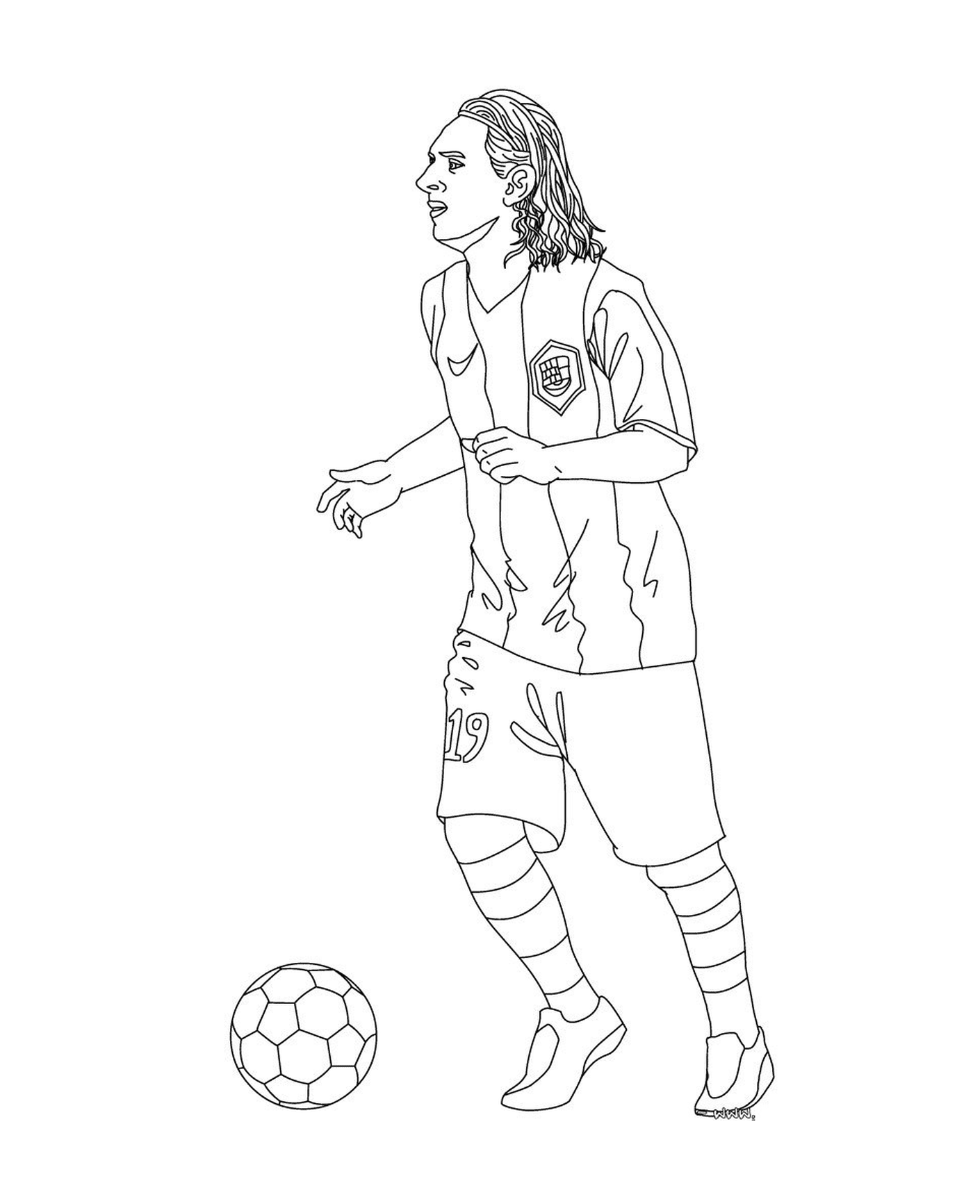  Ein Fußballspieler mit einem Fußball 