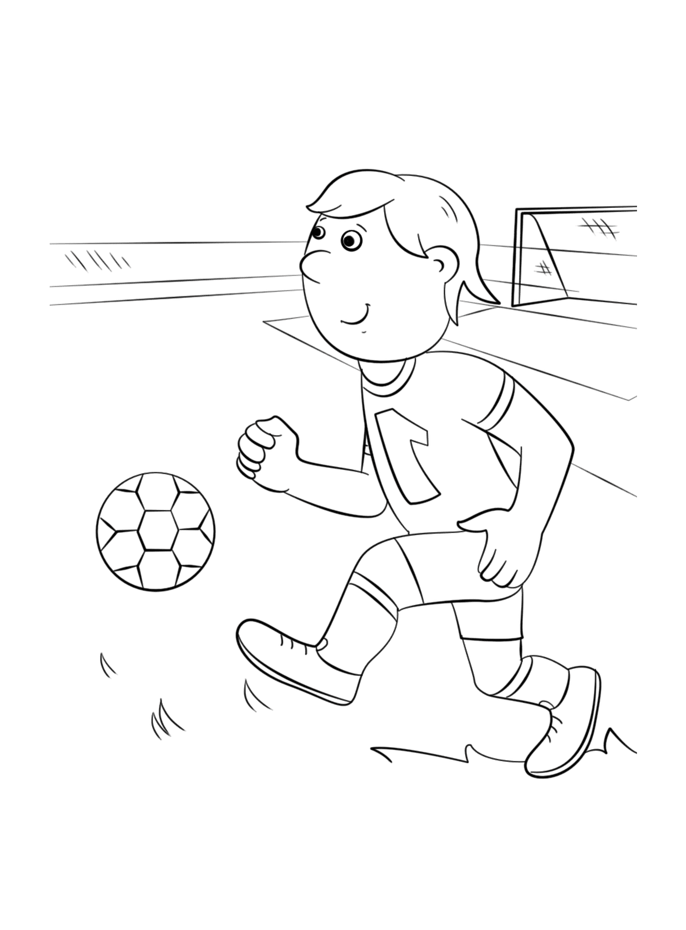  Ein Junge spielt Fußball 