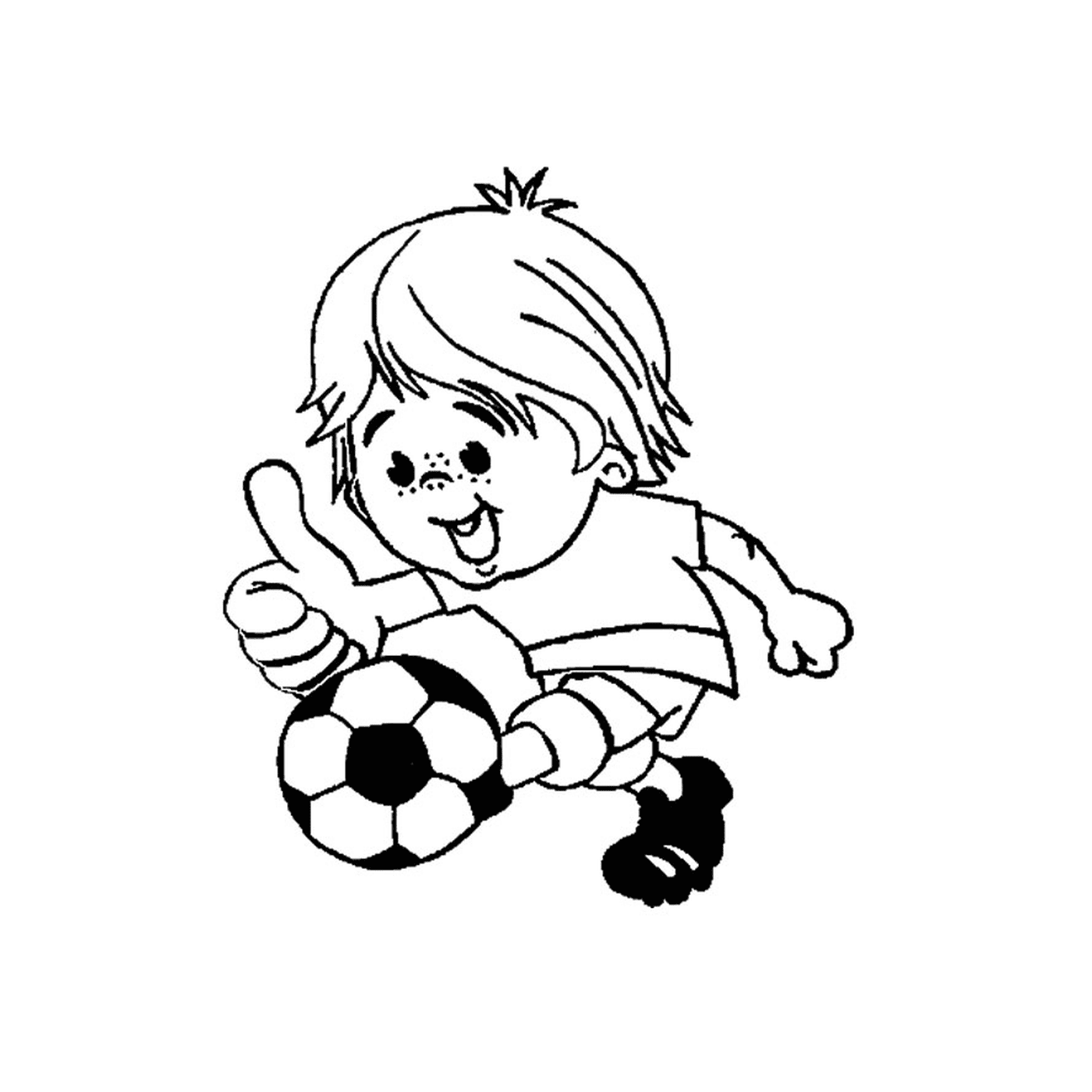  Un niño juega al fútbol 
