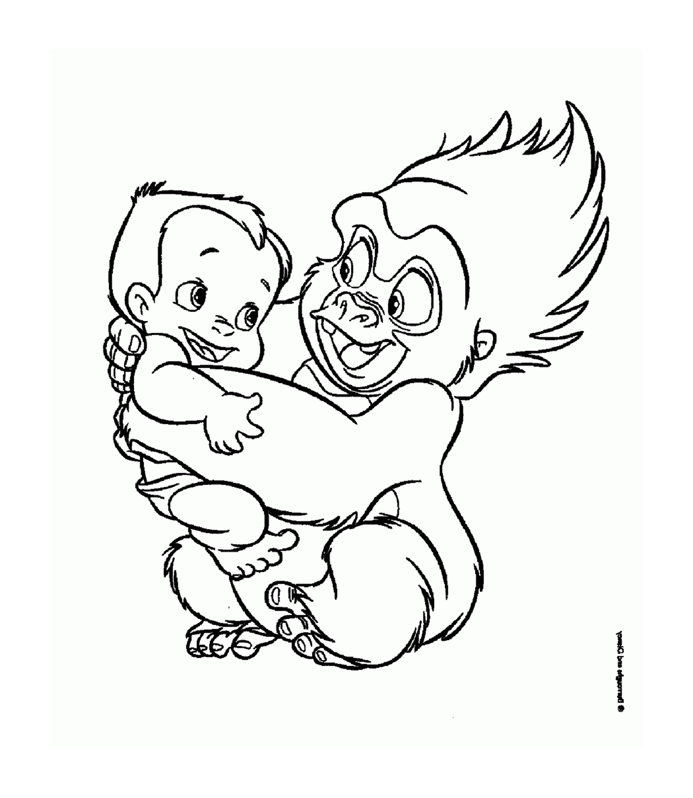  El gorila adulto y el bebé se abrazan 