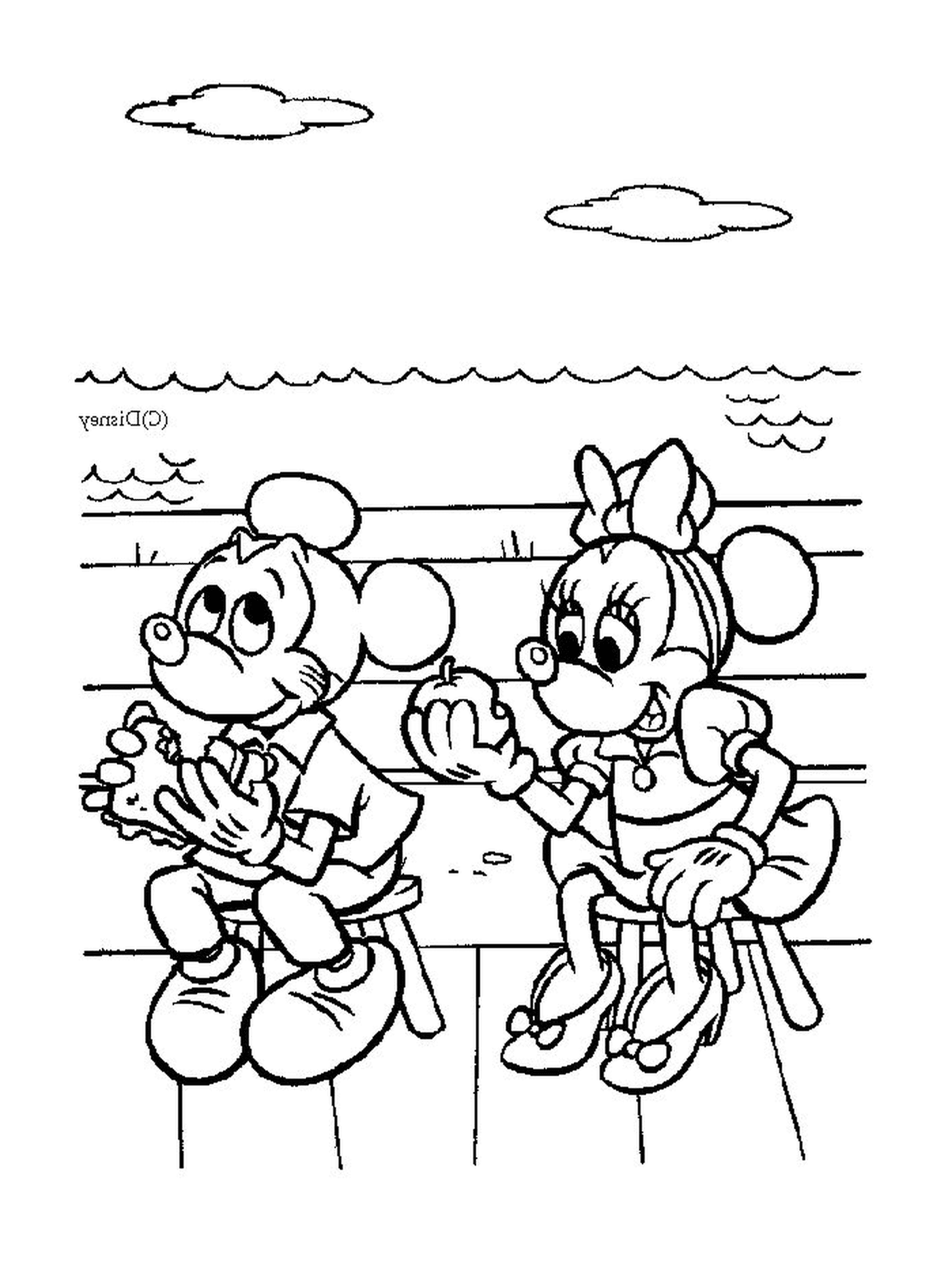  Mickey Mouse y Minnie Mouse sentados en un banco 