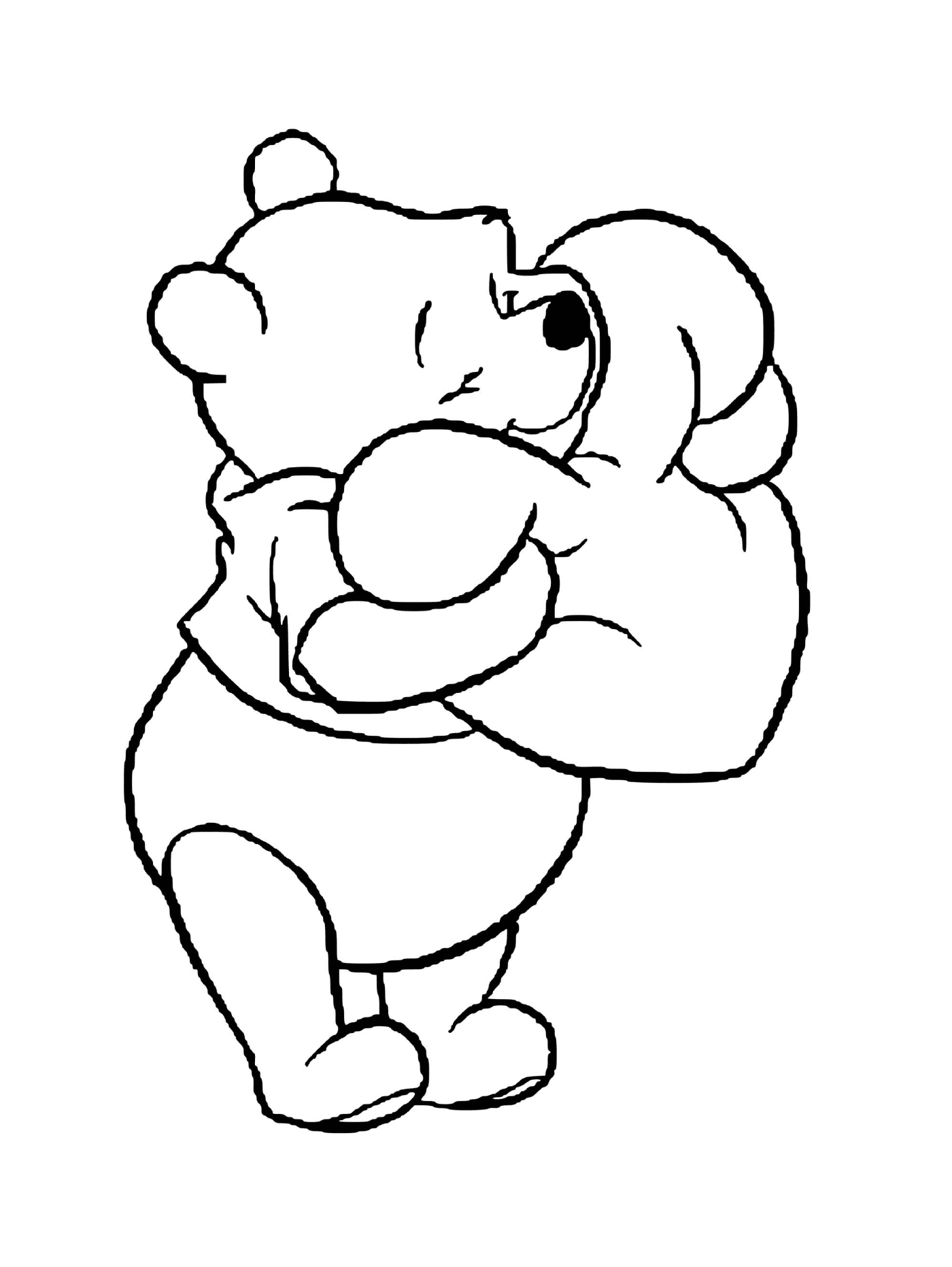  Winnie the bear receives a heart-shaped cushion 